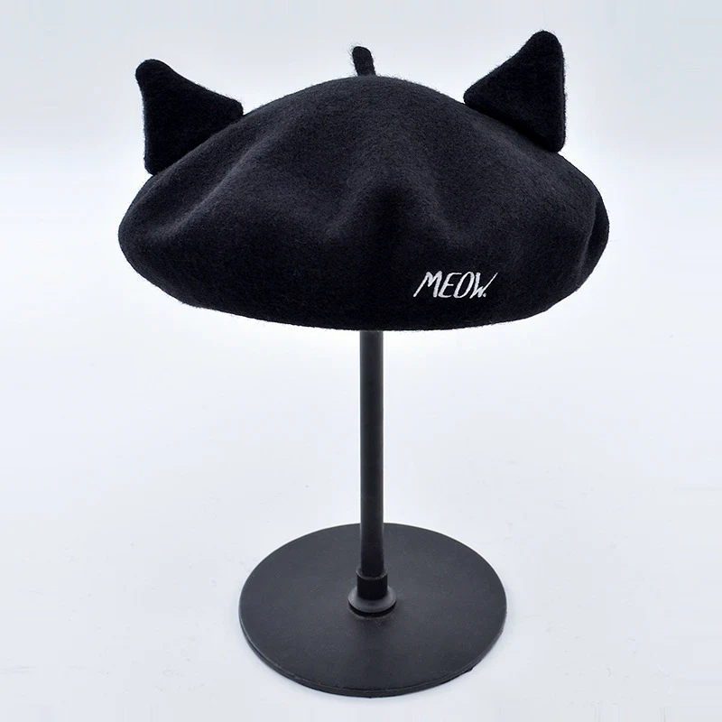 Title 2, Briefborduurwerk Kat Oren Wol Tweed Baret