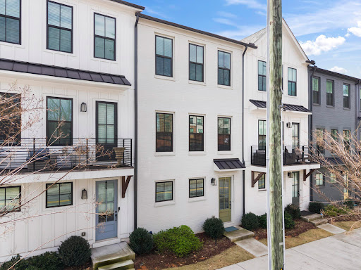 Modern white townhouse facades in this luxury house for sale in Atlanta ($499,000)