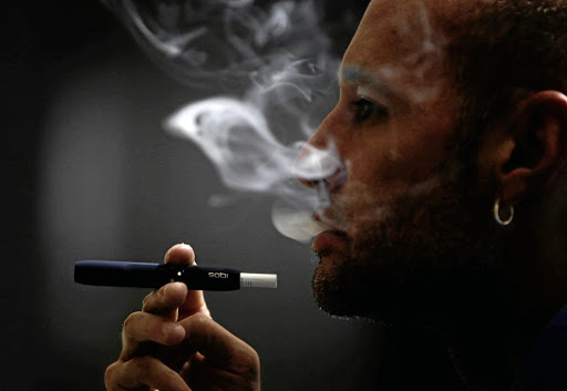 A Philip Morris iQOS smoking device. Picture: REUTERS