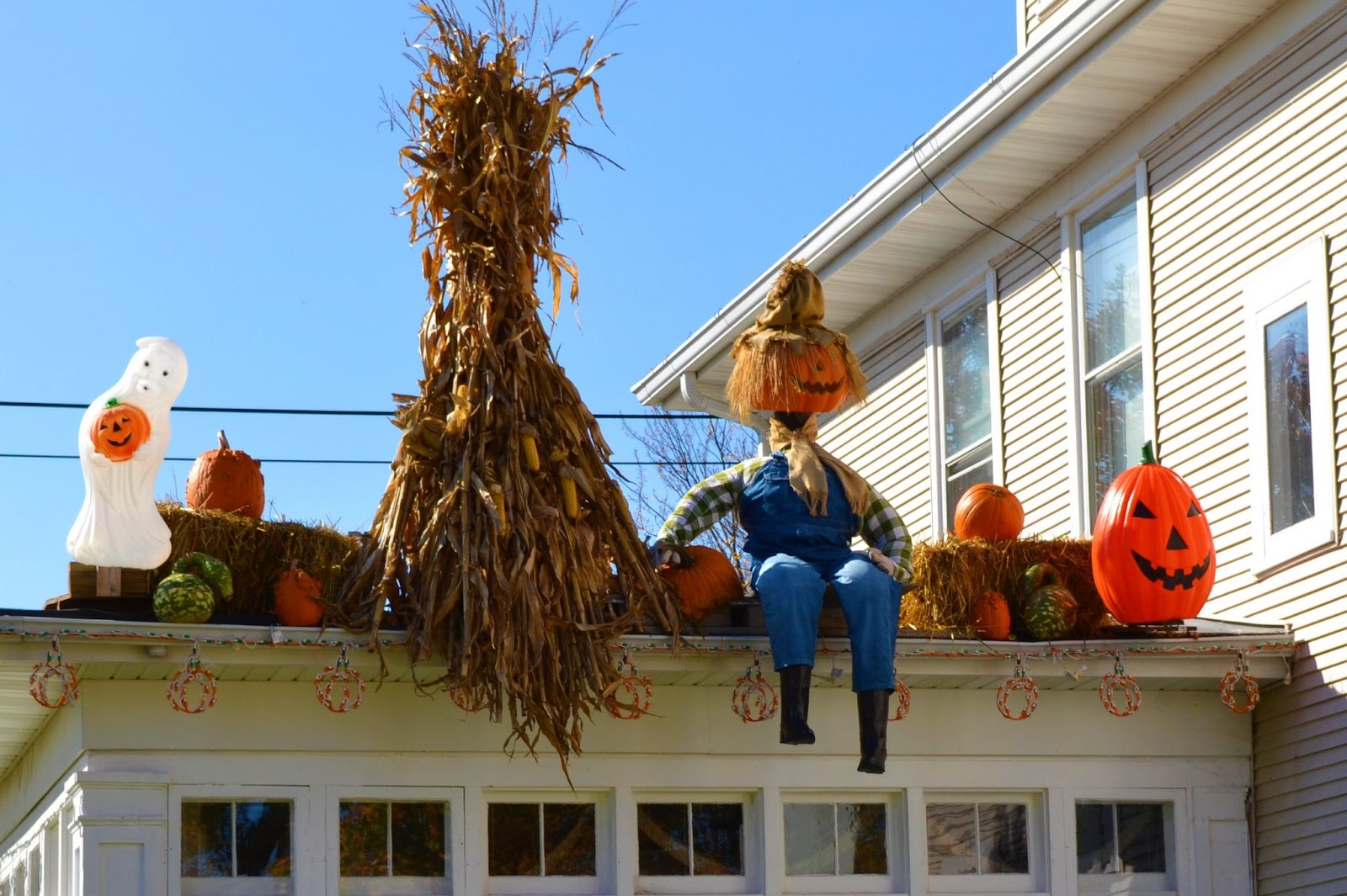 halloween props on house top