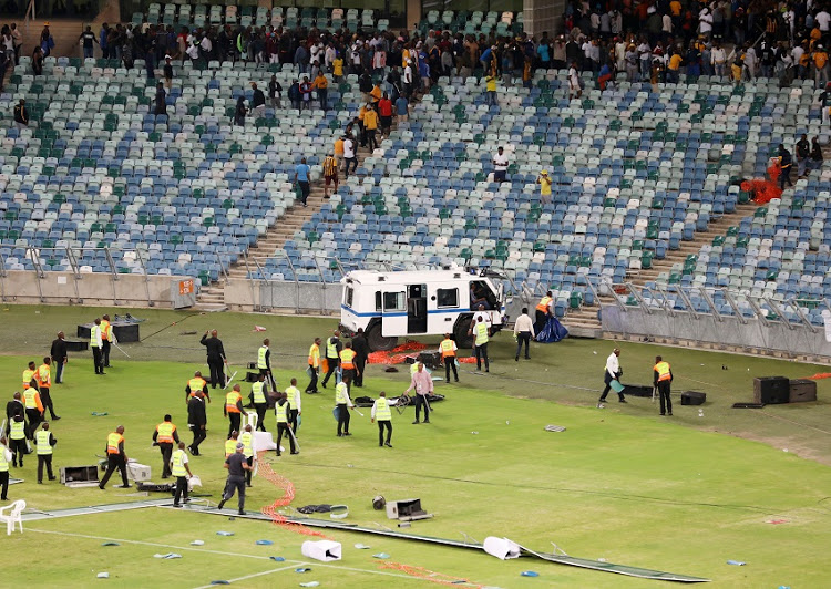 Fans vandalizing the stadium during the 2018 Nedbank Cup match between Kaizer Chiefs and Free State Stars at Moses Mabhida Stadium, Durban on 21 April 2018