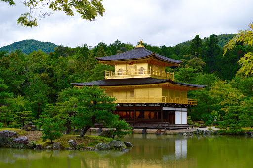 golden-temple-and-lake.jpg - Golden Temple, Kyoto Kinkaku-ji, or the Temple of the Golden Pavilion, is the well-known Zen Buddhist temple that is mostly covered in gold leaf and is surrounded by a garden from the Muromachi era, which is when Japanese garden designs flourished.