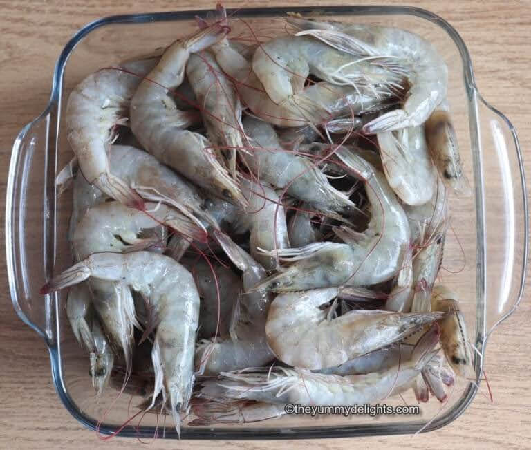 close up of fresh prawns in a glass tray to make fried rice recipe