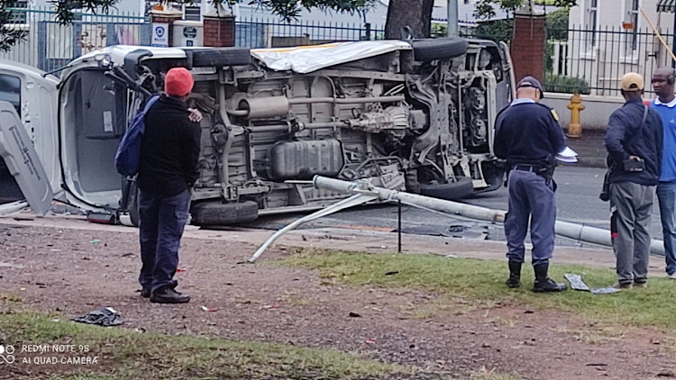 The taxi overturned after a collision with another taxi in Durban