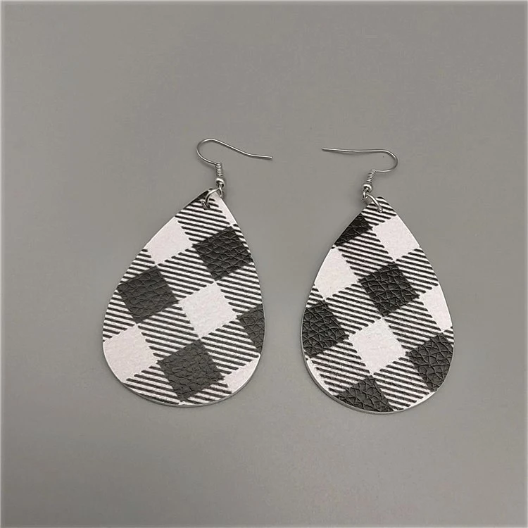 Druppelvormige leren oorbellen met duplex print, stijlvol en lichtgewicht. Ervaar de verfijning en unieke stijl van deze accessoires.