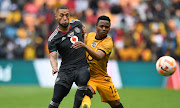 Miguel Timm of Orlando Pirates challenges Nkosingiphile Ngcobo of Kaizer Chiefs during their Carling Black Label Cup clash at FNB Stadium.