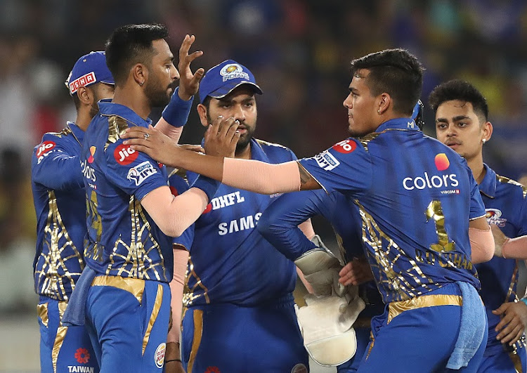 The Mumbai Indians celebrate the wicket of MS Dhoni of the Chennai Super Kings during the Indian Premier League Final match between the the Mumbai Indians and Chennai Super Kings at Rajiv Gandhi International Cricket Stadium on May 12, 2019 in Hyderabad, India.