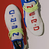 n.e.r.d. & creme introduce the pw hu nmd "homecoming"