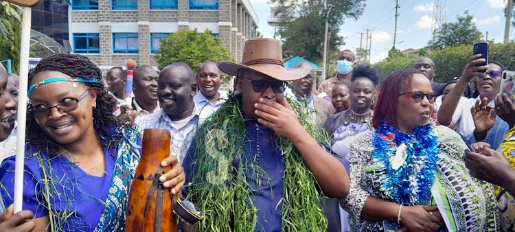 Phillip Kirwa celebrates with staff at Moi Teaching and Referral Hospital on May 18, 2024