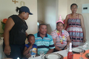 Onthatile Sebati (wearing cap) with Quinton, Solomon, Mmatshepo and Tshegofatso, who was pregnant. Here, the family is celebrating Mmatshepo's 40th birthday.