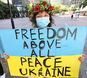 A group of Ukrainian citizens protest outside the Russian embassy in Cape Town on February 25 2022. They are calling for a stop to Russia's incursion into Ukraine. 