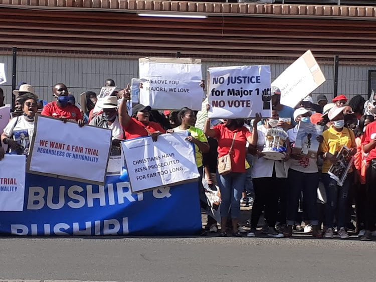 Self-proclaimed prophet Shepherd Bushiri's supporters came out in numbers and braved the scorching sun as they sang songs in support of their "father" at the Pretoria magistrate's court on Friday.