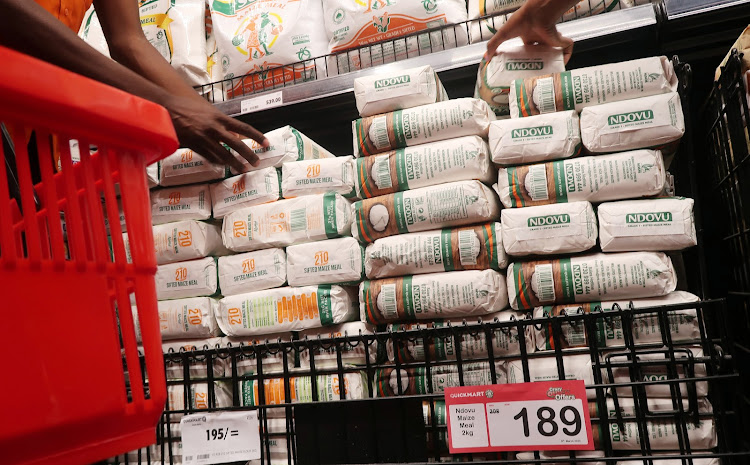 Customers buy Maize flour at Quickmart Thome in Marurui on March 3, 2023/ WINNIE WANJIKU