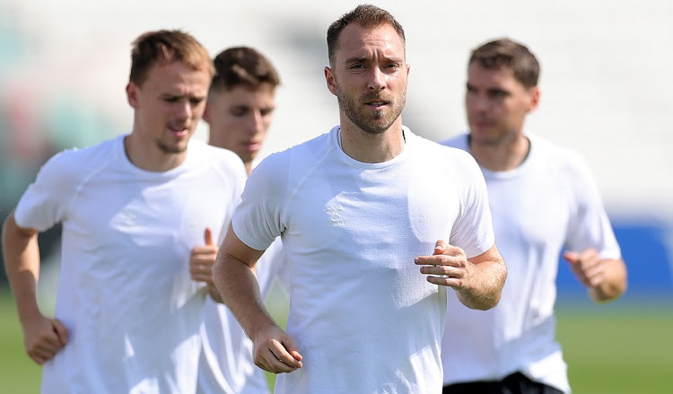 Christian Eriksen of Denmark and teammates during a training session in Doha, Qatar on November 17 2022.