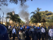 Fires were started near the Zanu-PF headquarters in Harare on August 1, 2018 as MDC Alliance supporters protested against the early election results.