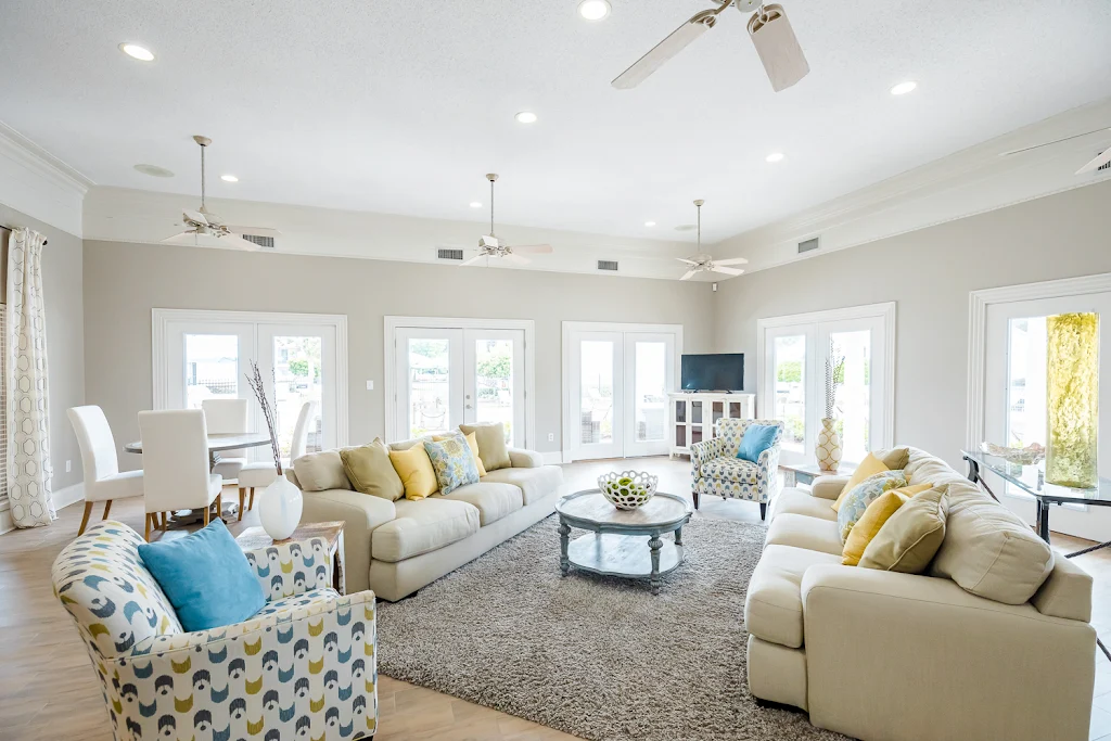 Clubhouse lounge area with seating and a TV