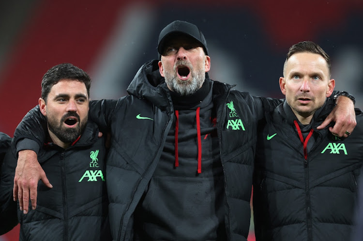 Liverpool manager Juergen Klopp celebrates winning the League Cup after victory in the final against Chelsea at Wembley Stadium in London on Sunday.