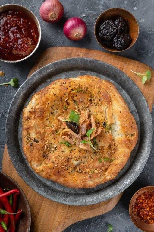 Mutton Achaari Kulcha With White Butter, Dal Makhani & Tomato Murabba