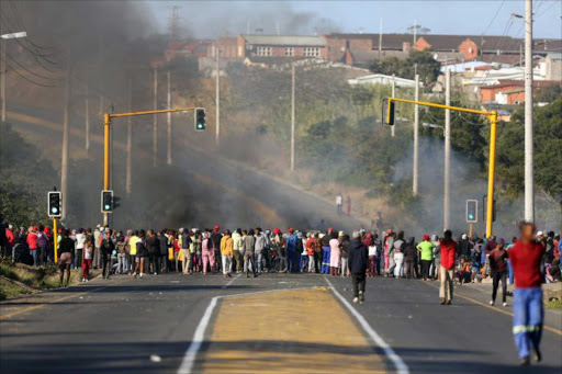 Hundreds of residents from Vergenoeg and Egoli protesting on the streets yesterday Picture: MARK ANDREWS