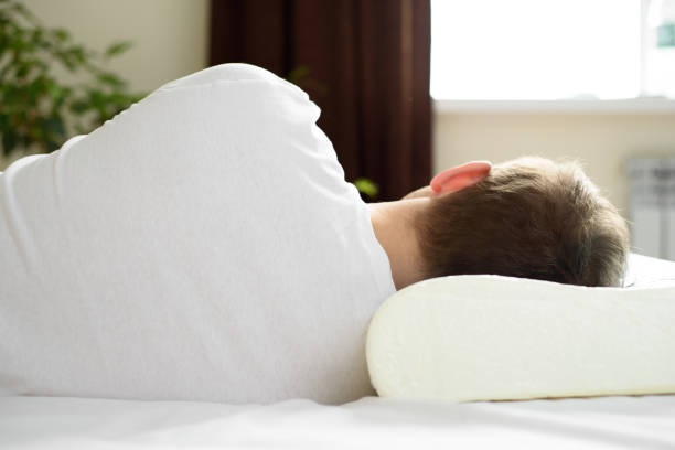 sleeping on contour pillow