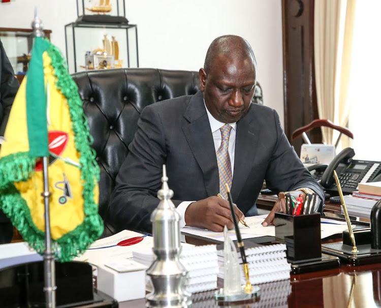 President William Ruto assenting to the County Governments Additional Allocation Bill, 2022 at State House on December 12, 2022