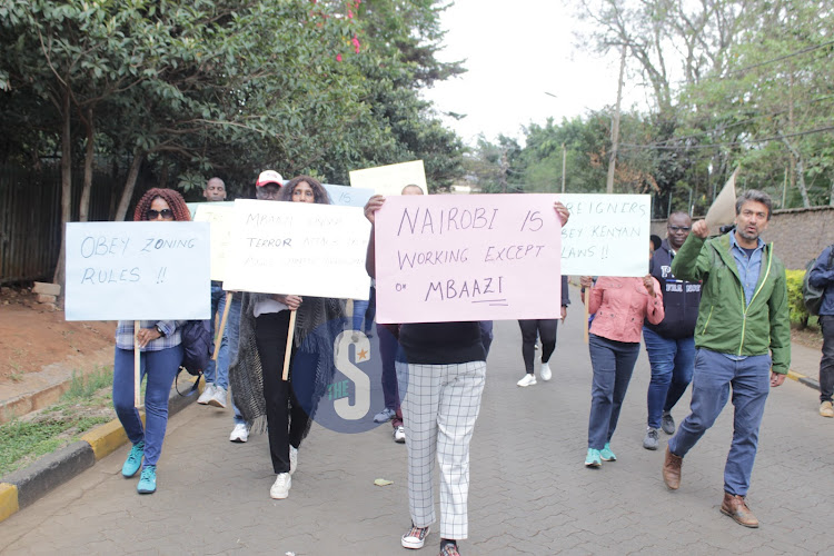 Residents of Mbaazi Avenue in Lavington protest against the construction of a 13 storey building with 512 units on October 26, 2023.