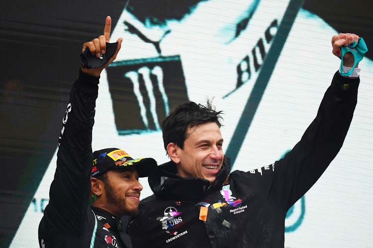 Lewis Hamilton of Great Britain and Mercedes GP with Mercedes GP Executive Director Toto Wolff