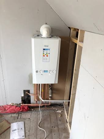 Combi Boiler moved from Kitchen to Attic Space.  album cover