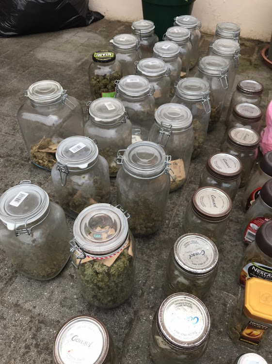 Jars of dagga products and magic mushrooms, with a street value of more than R1.5m, seized by Port Elizabeth police on Sunday in Kabega Park