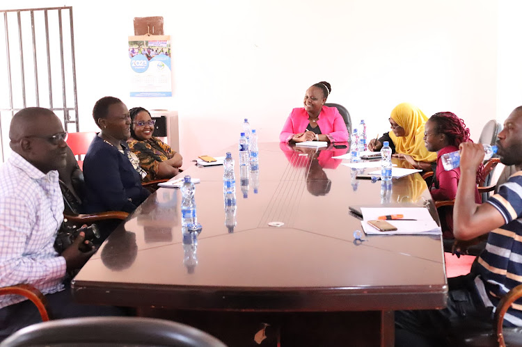 Talent management and social services executive Francisca Kilonzo engages with a delegation from Sauti Ya Wanawake organization at Kwale Cultural Centre in Matuga sub-county on Wednesday, February 15, 2023.