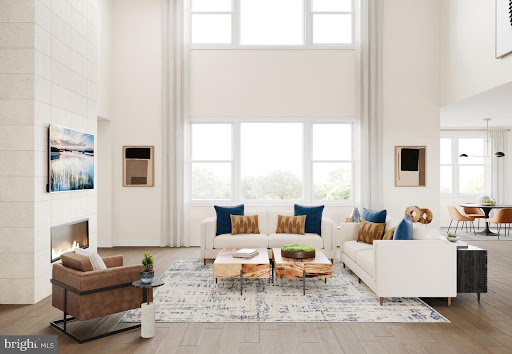 Modern living room with white sofa and fireplace - Buy this luxury property in Warminster, 5 bedrooms