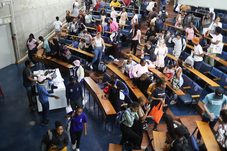 Students leave a class as protesters disrupt proceedings at the University of the Witwatersrand in Johannesburg on March 2 2023.