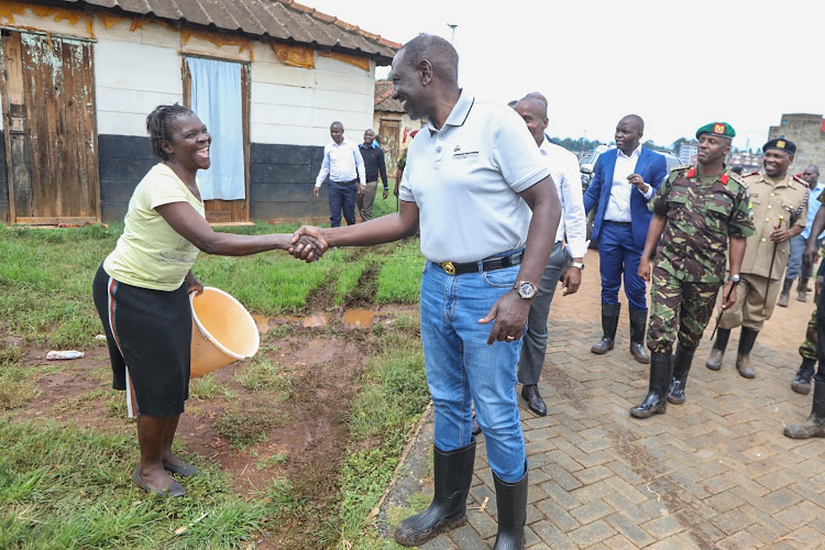 President William Ruto greets residents in Kiamaiko on April 6, 2024.