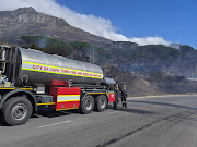 The raging fire on Devil's Peak was largely under control on Monday afternoon but hotspots and flare-ups are expected to continue. 