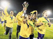 EXTRA-TIME EDGE: Brazil players celebrate after defeating Portugal in the Fifa U-20 World Cup final in Bogota, Colombia, on Saturday.  PHOTO:   REUTERS