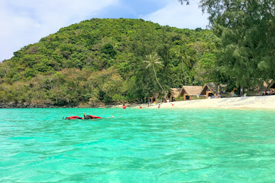 Swim over the coral reef in Mai Ngam Bay