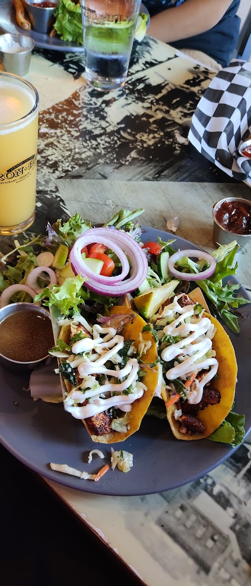 White fish tacos with corn tortillas and side salad