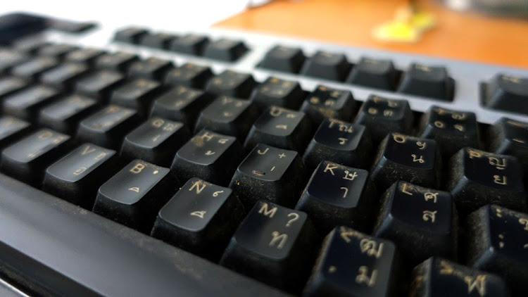 Each strike of a computer keyboard both deposits and picks up microorganisms.