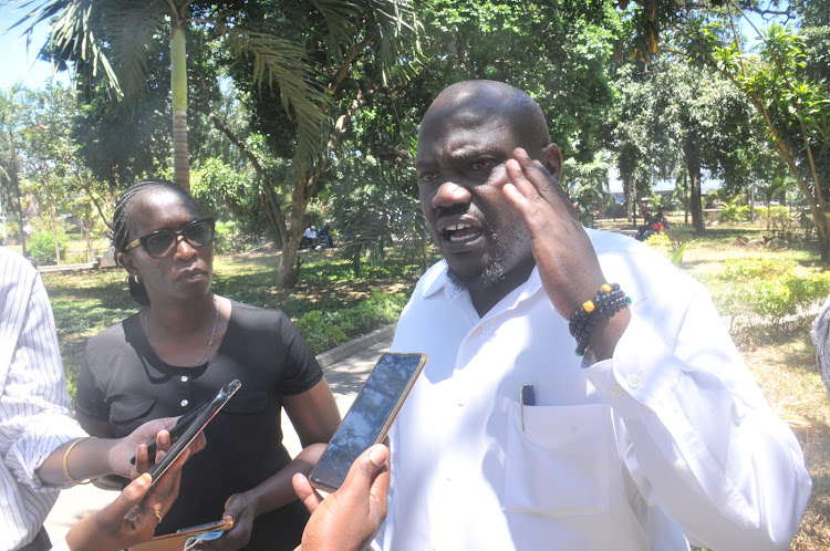 Kenya Long Distance Truck Drivers Union chairman Roman Waema addresses journalists in Mombasa on October 25