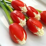 Grape Tomato Cream Cheese Tulips was pinched from <a href="http://www.shockinglydelicious.com/grape-tomato-cream-cheese-tulips/" target="_blank">www.shockinglydelicious.com.</a>