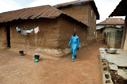 Benedict Ogbu, 53, who lost his wife, Theresa Ogbu, in an attack by gunmen on worshippers during a Sunday mass service, walks through his neighbourhood as he makes his way to church in Owo, Ondo, Nigeria on June 7, 2022. 