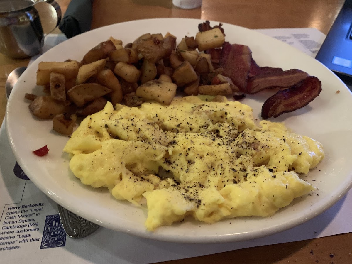 Eggs, bacon was the bomb, and home fries made in a safe frier