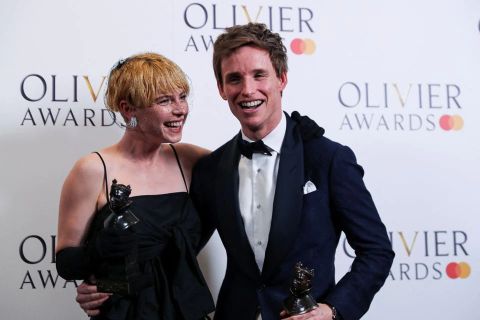 Jessie Buckley and Eddie Redmayne pose after wining the Best Actress and the Best Actor in a Musical awards for the "Cabaret" at the Olivier Awards in the Royal Opera House in London, Britain April 10, 2022.