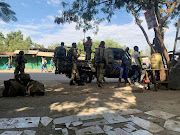 Members of the Ethiopian National Defence Force (ENDF) prepare to head to mission in Sanja, Amhara region, near a border with Tigray, Ethiopia, on November 9 2020. 