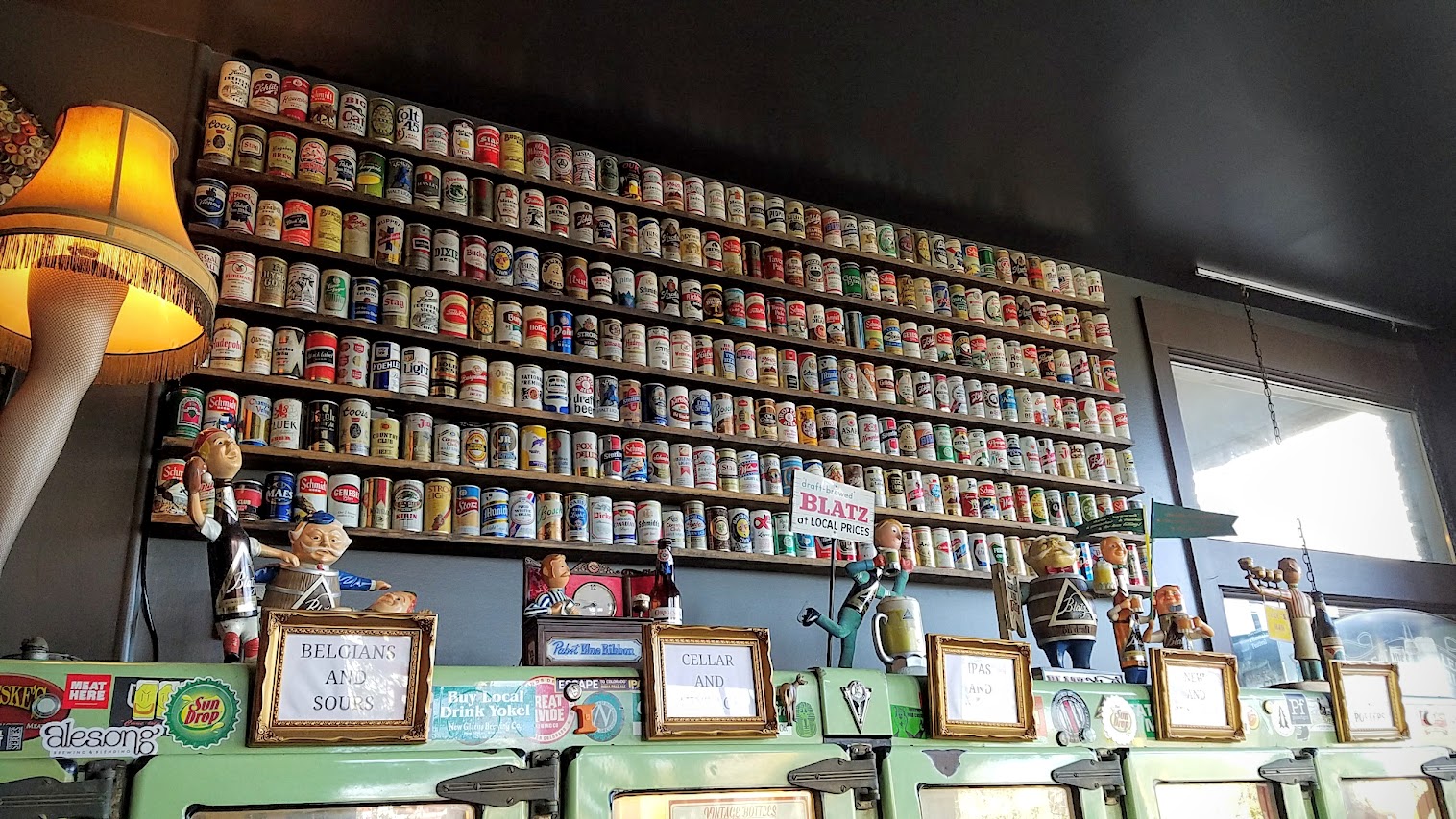 When you walk through that door of Saraveza, you immediately feel a bit like you're in a beer museum with all the retro beer paraphernalia all along the walls