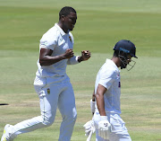 Lungi Ngidi of the Proteas celebrates the wicket of Kannaur Rahul of India on day 4 of the first Test at SuperSport Park in Centurion on December 29 2021.