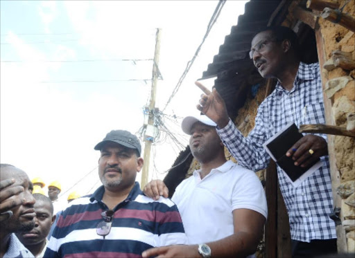 LIGHTING UP KENYA: Mvita MP Abdulswamad Nassir with Mombasa Governor Hassan Joho and KPLC managing director Ben Chumo in Tudor, Mombasa, yesterday. Photo/Andrew Kasuku