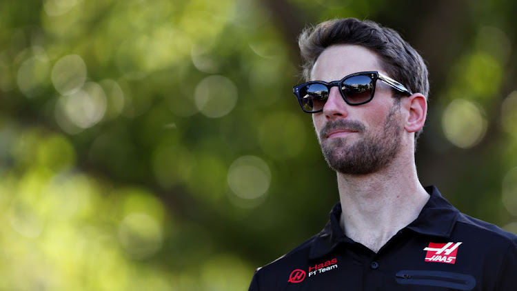 Romain Grosjean of France and Haas F1 walks in the Paddock during previews ahead of the F1 Grand Prix of Australia at Melbourne Grand Prix Circuit on March 12, 2020 in Melbourne, Australia.