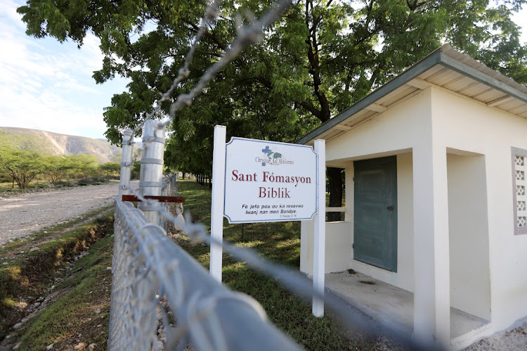 A sign reading "Bible Training Centre, Strive to receive praise from God" is seen at the Christian Aid Ministries compound after the abduction of a US-based group of missionaries fueled international concerns over gang violence, in Titanyen, on the outskirts of Port-au-Prince, Haiti October 18, 2021.