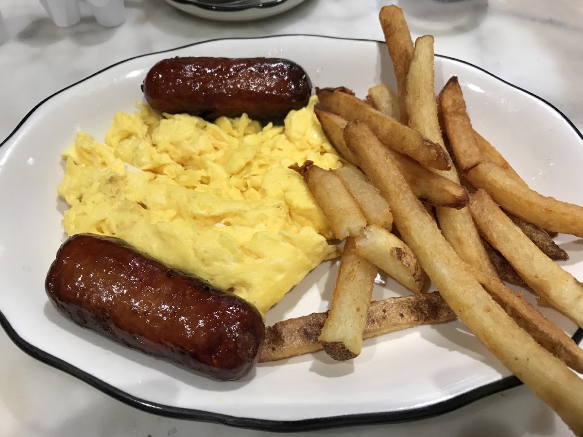 3 scrambled eggs with “potatoes” (actually just french fries), and sausage made gluten free. Sausage was really good